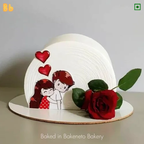 Semi circle, Rose cake with beautiful couple design on it. You can Order cakes online in Noida, Indirapuram and Gaur City Noida Extension by bakeneto.com